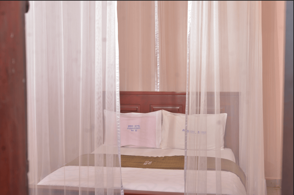 Luxury hotel rooms and suites at Bredo Hotel Mukono with premium amenities